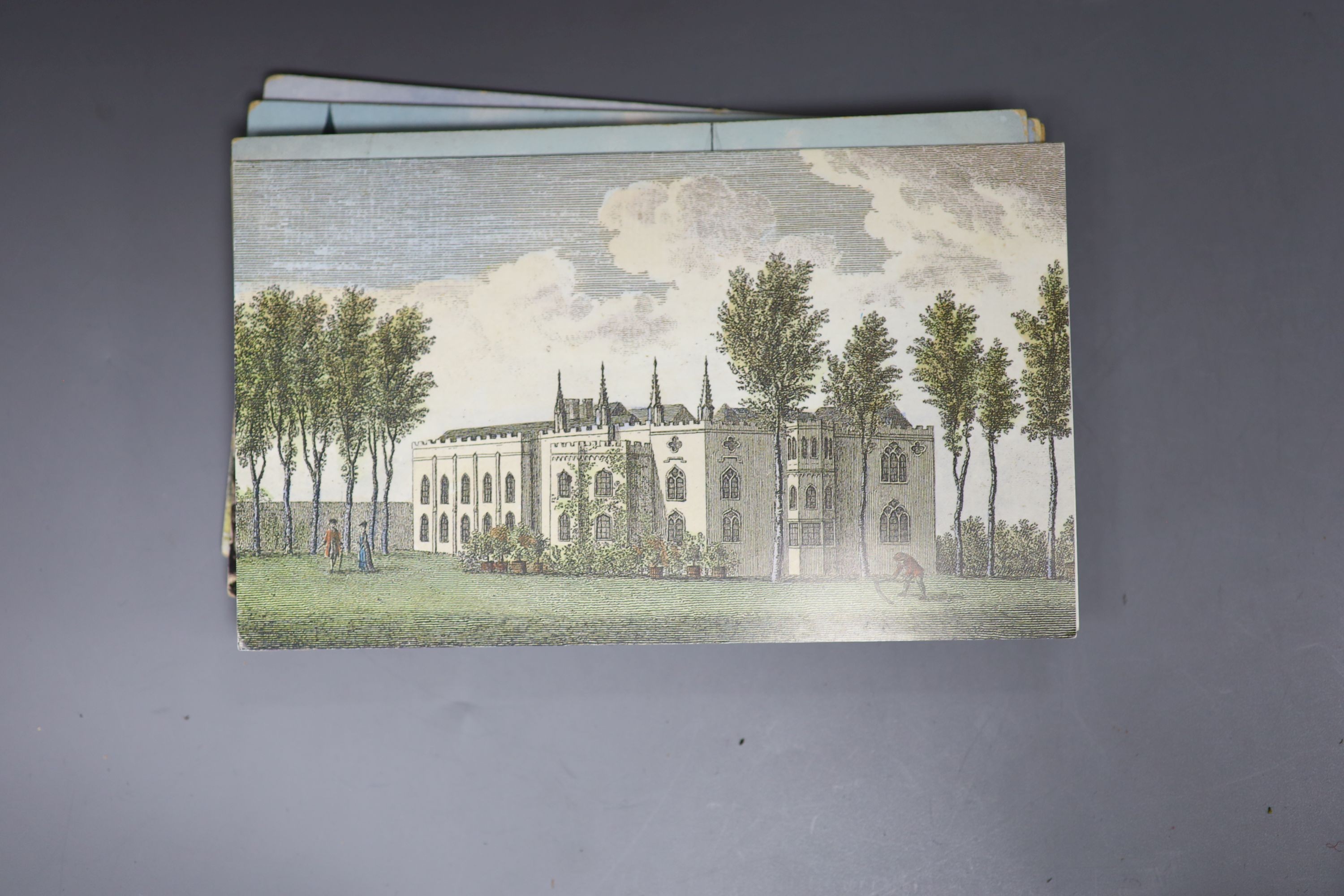 An album of Edwardian and later postcards, including Brighton and Sussex views